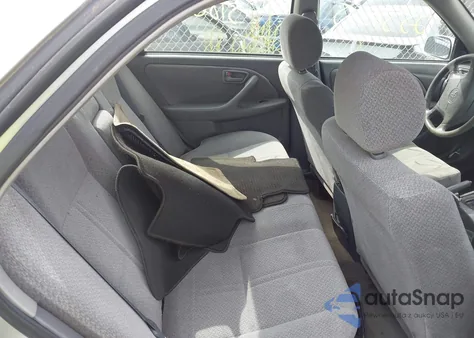 2000 Toyota Camry Le z USA, uszkodzony, nr VIN JT2BG22K2Y0467133